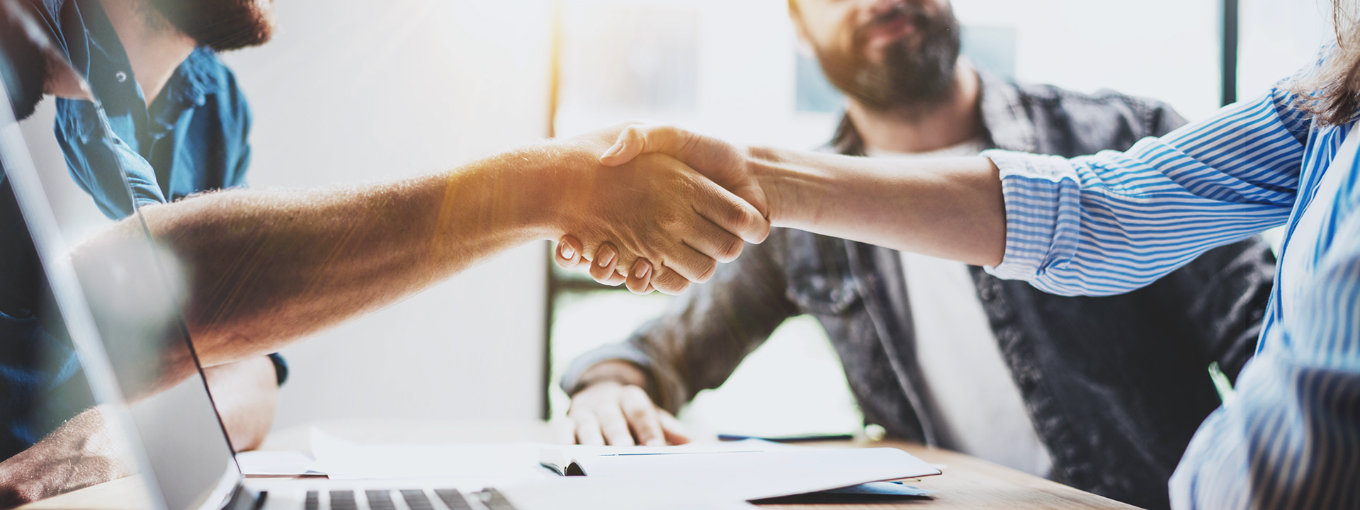 Business partnership handshake concept